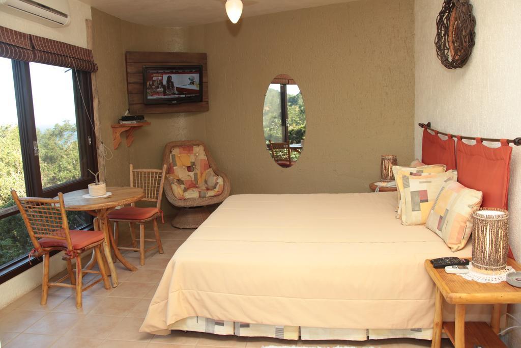 Bangalore Suites Garopaba Værelse billede